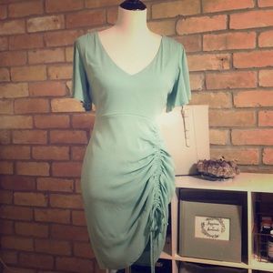 Mint color casual dress with side rouging